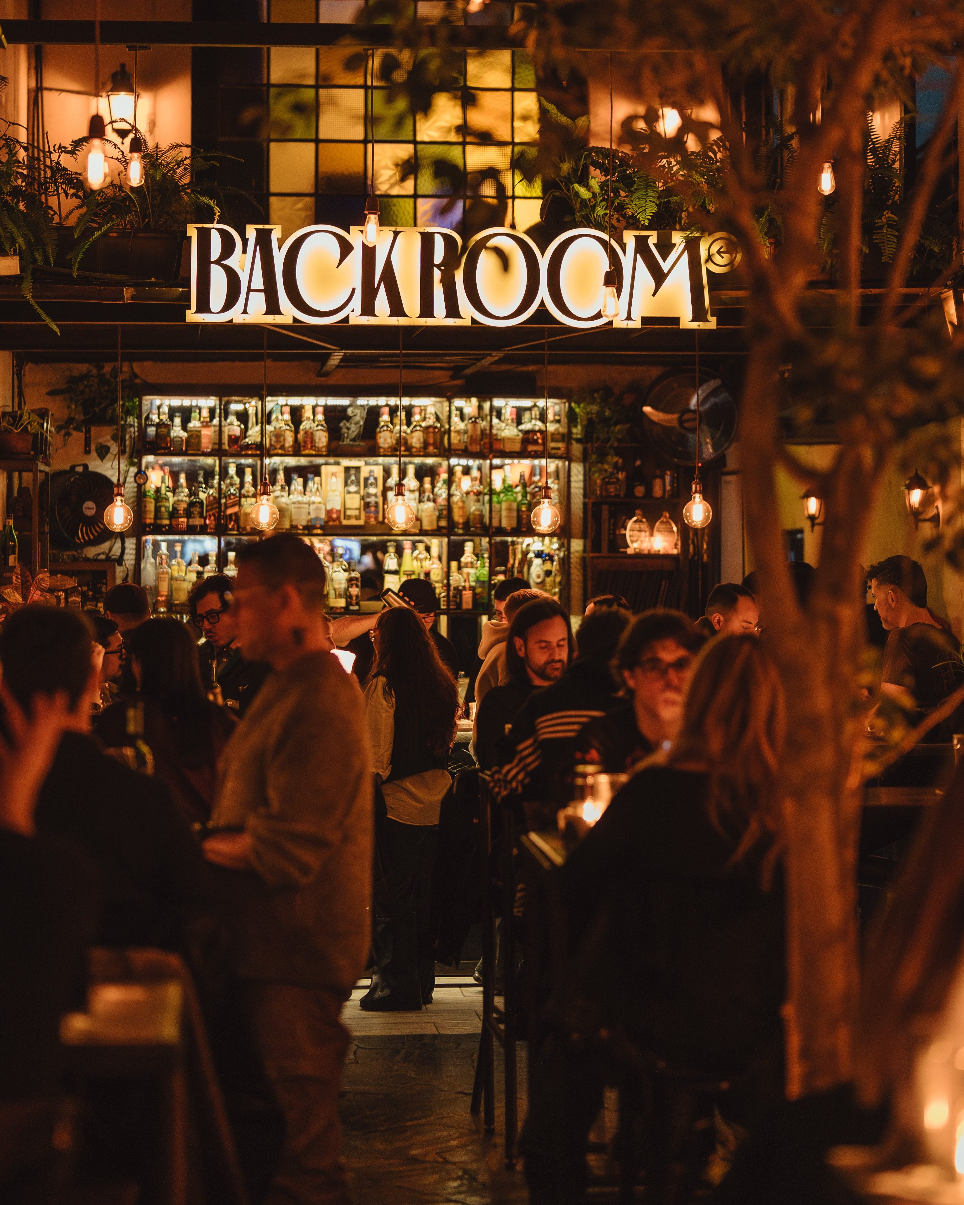 The Backroom Buenos Aires dining room, with the illuminated sign
